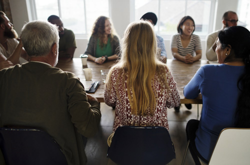 diverse people in a meeting