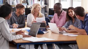 Group of teachers sitting around a table