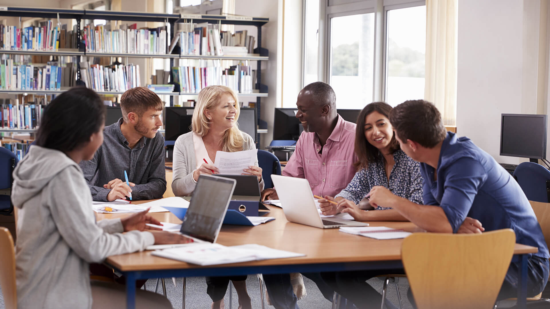 Group of teachers sitting around a table